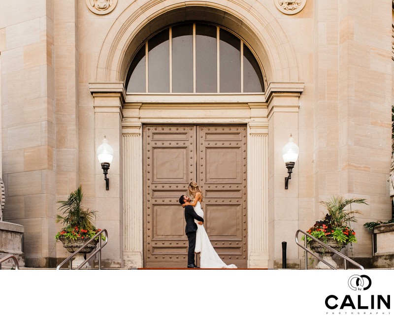 Groom Lifts Bride at Liberty Grand Wedding