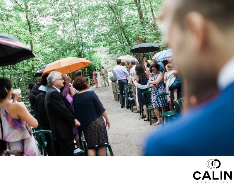 Groom Looks at Bride Walking Down the Aisle