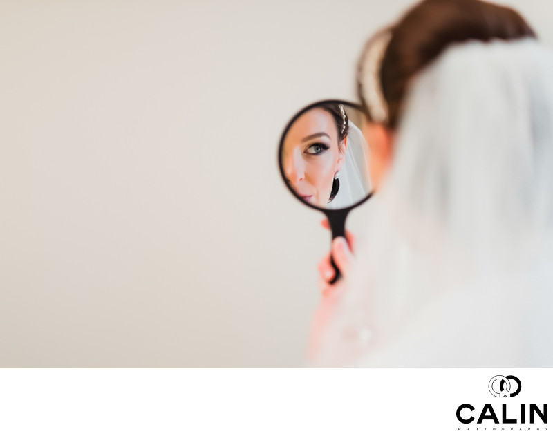 Beautiful Bride is Looking in the Mirror