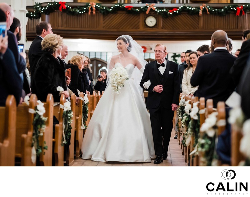 Bride Walks Down the Aisle with Her Father 