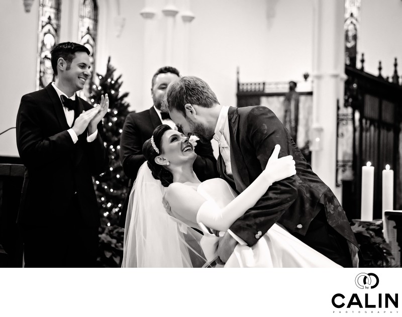 Groom Dips Bride During Wedding Ceremony