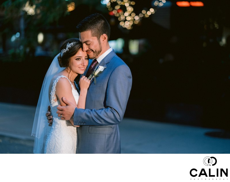 Groom Holds Bride