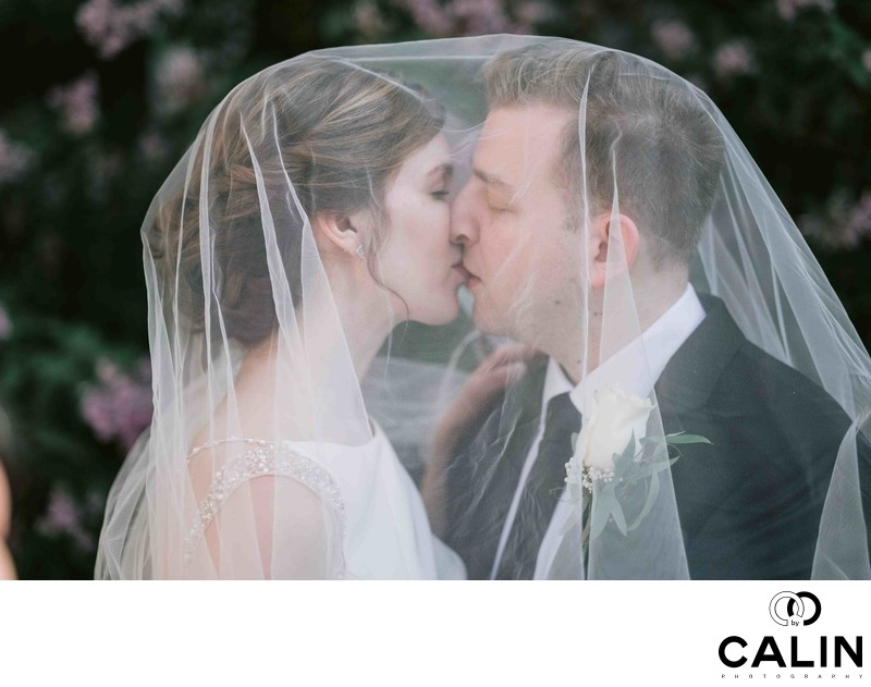 Newlyweds Kiss Under the Veil at Old Mill Toronto