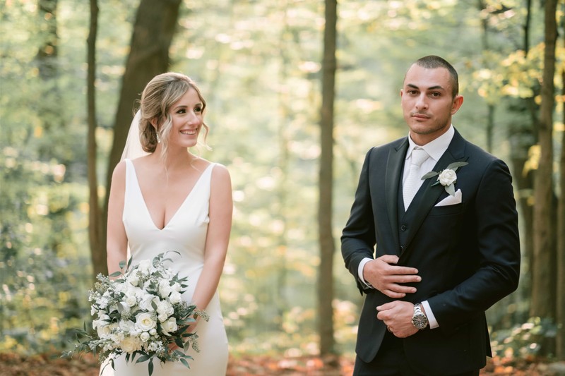 Bride Looks at Groom at Kortright Centre