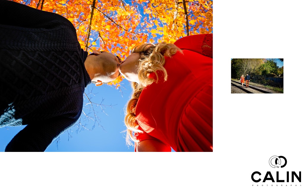 Engagement Photo of Couple under Maple Tree and by Rails