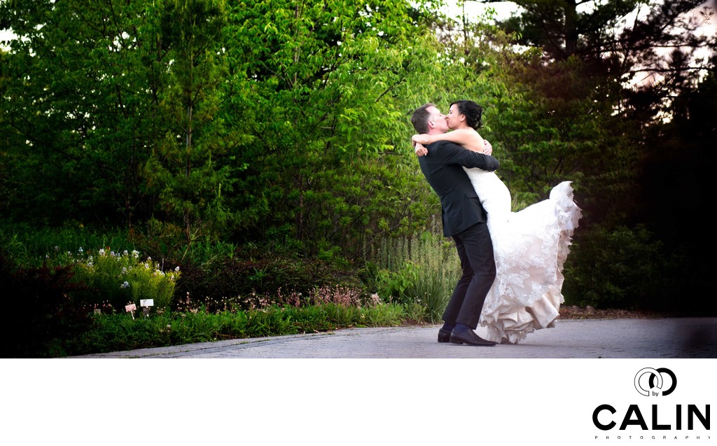 Groom Lifts Bride at Toronto Botanical Garden Wedding