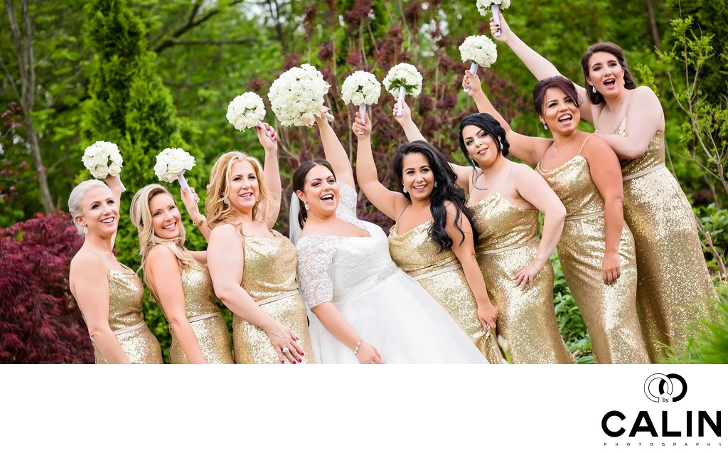 Bridesmaids Wave Their Bouquets