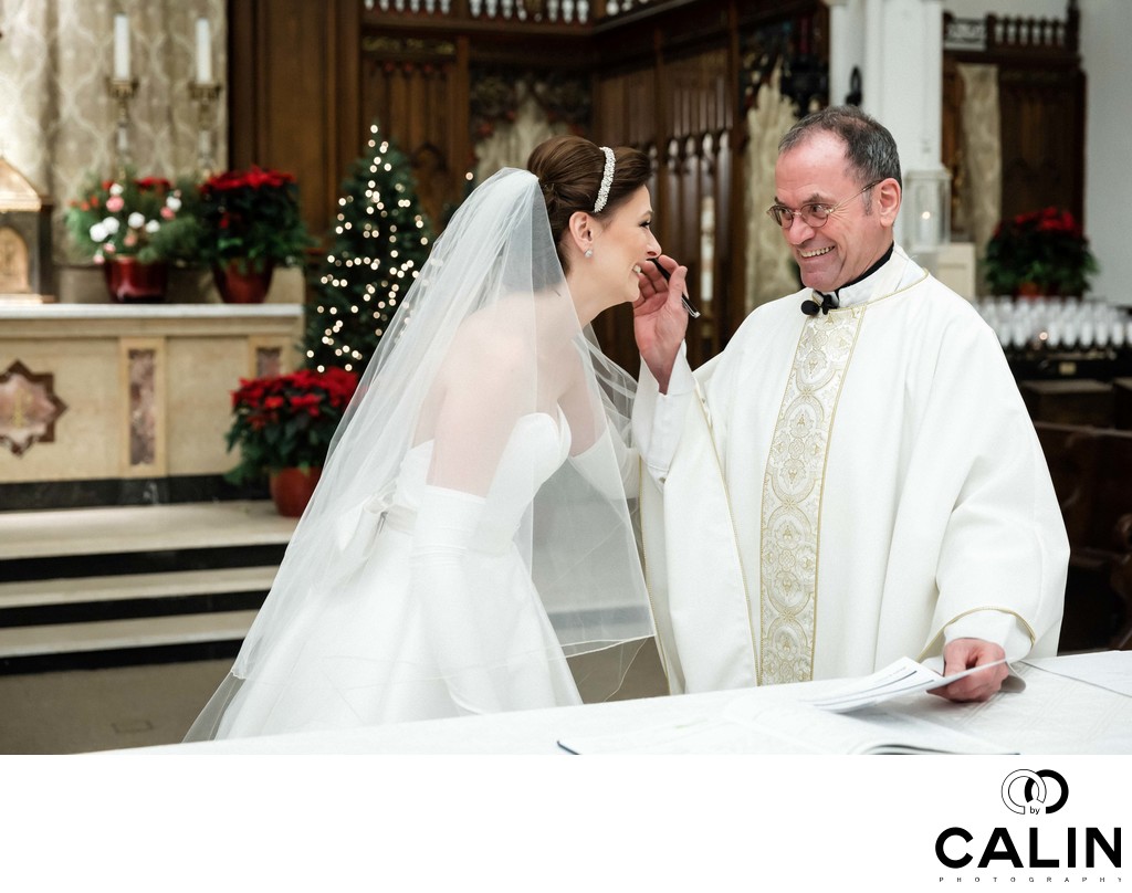Priest Congratulates Bride