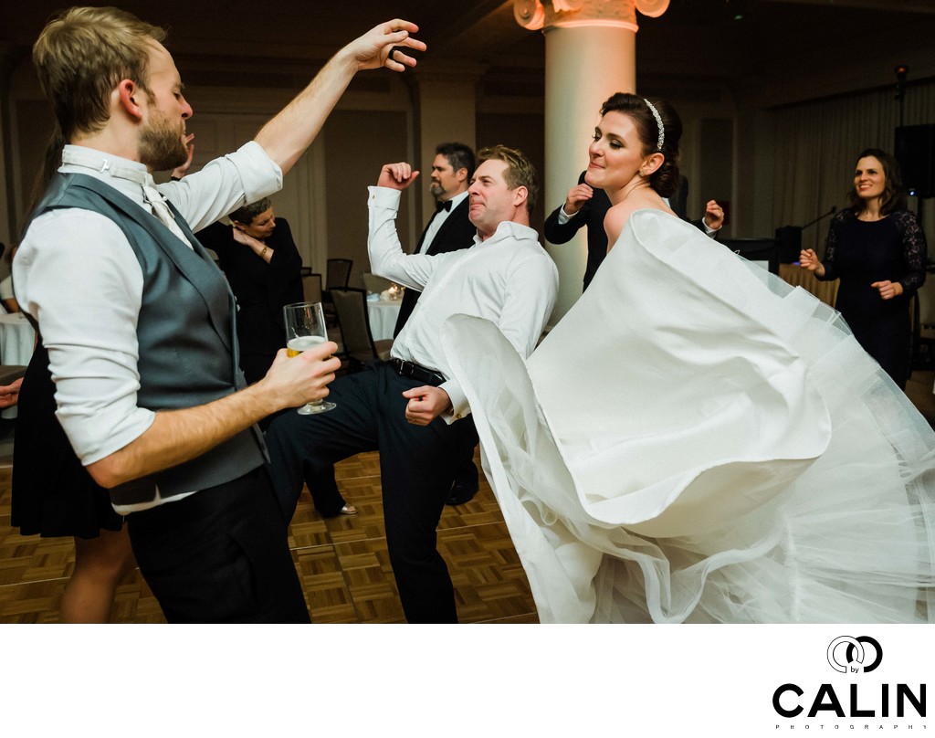 Newlyweds and Guests Dance