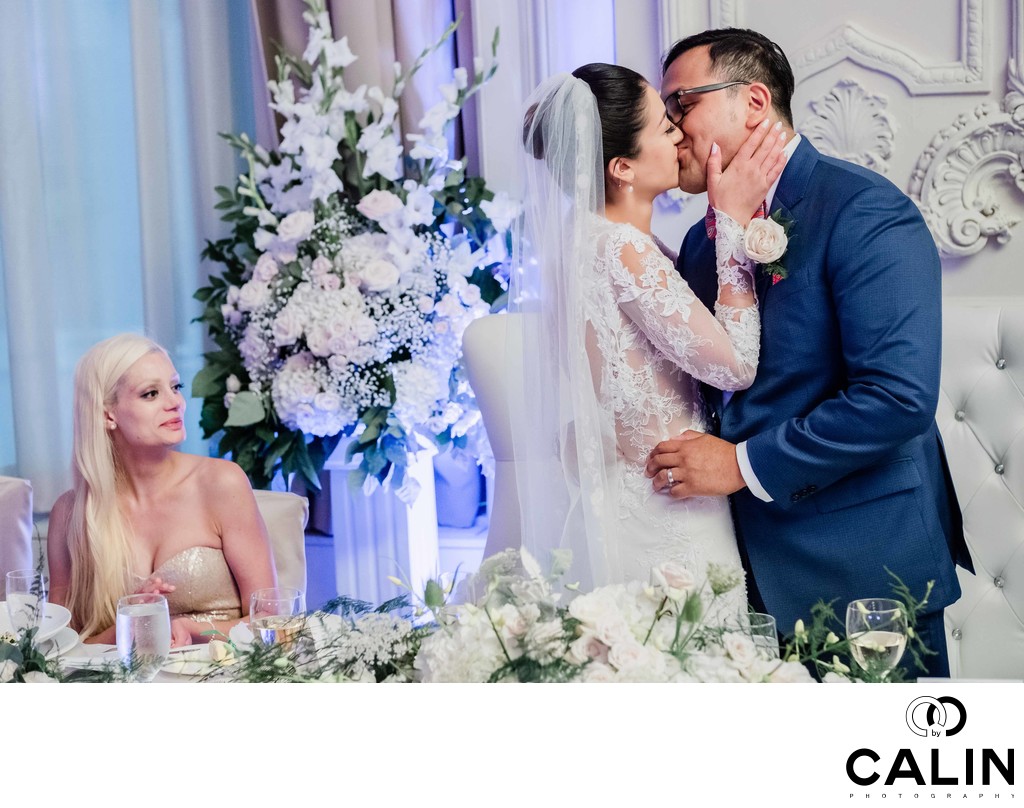Bride and Groom Kiss in the Crystal Ballroom