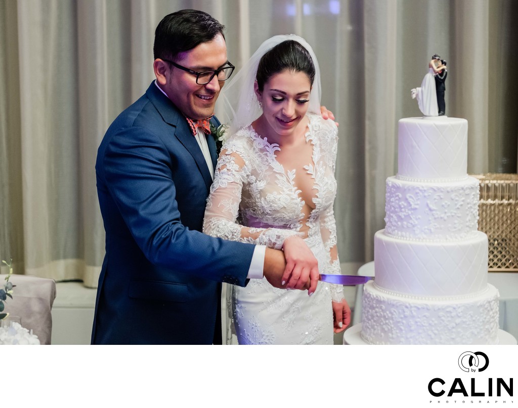 Newlyweds Cut the Cake in the Crystal Ballroom