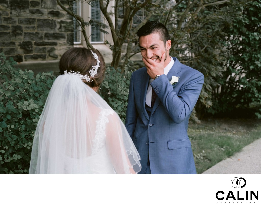 Groom Laughs Looking at the Bride