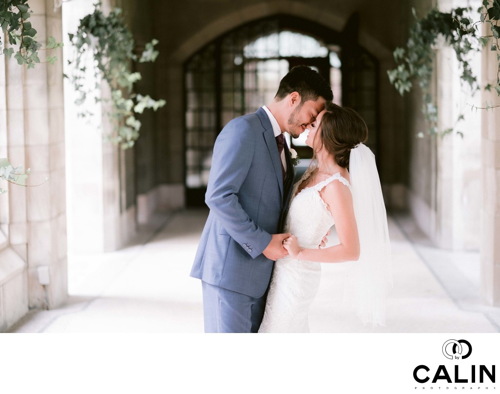Bride and Groom Touch Foreheads Before Kiss