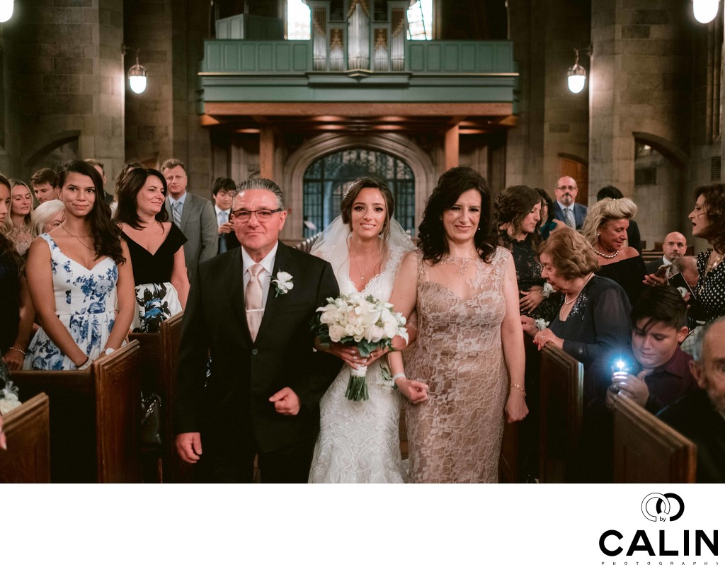 Bride and Parents Walk Down the Aisle