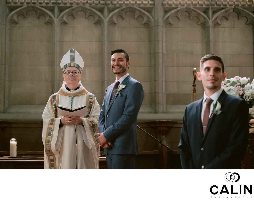 Groom Looks at Bride and Smiles