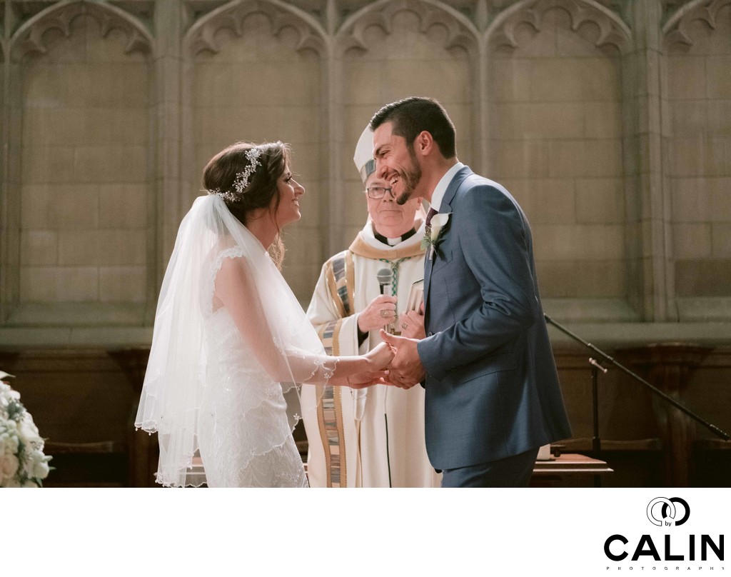 Bride and Groom Laugh after First Kiss