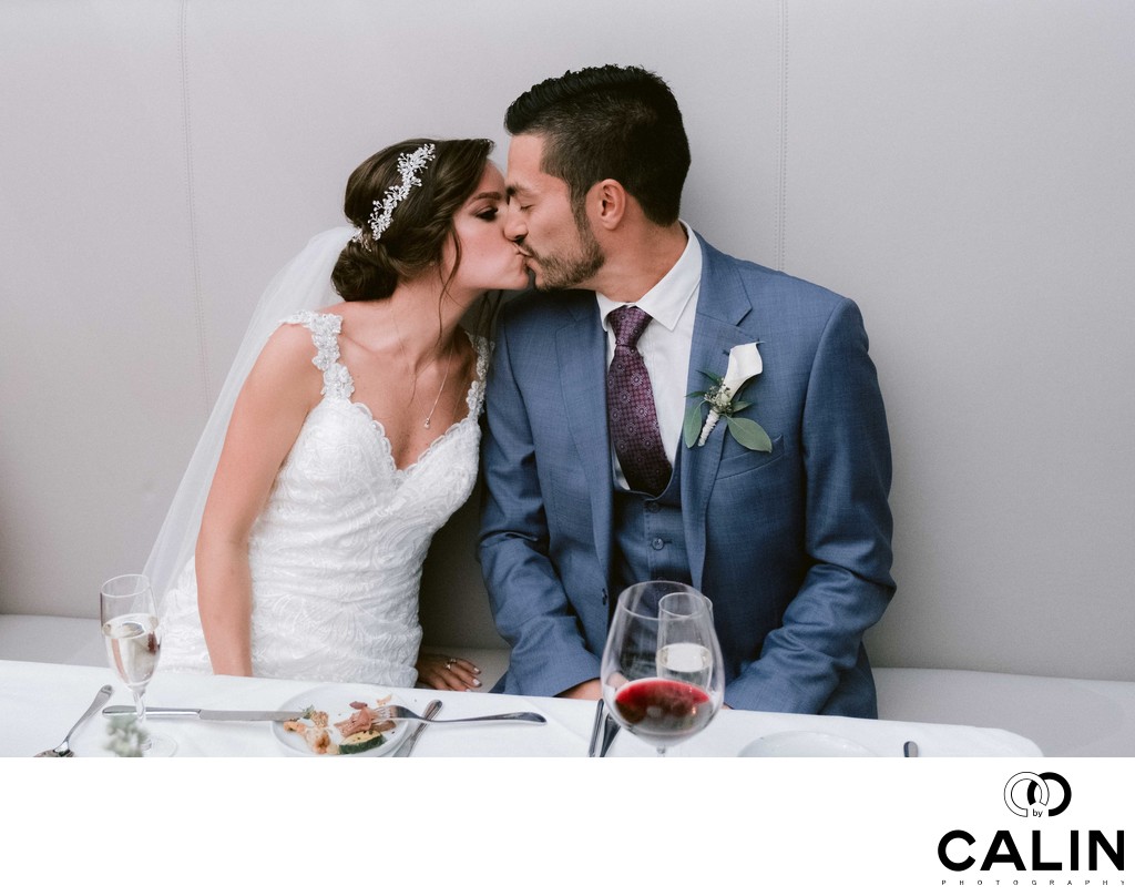 Bride and Groom Kiss at Sassafraz