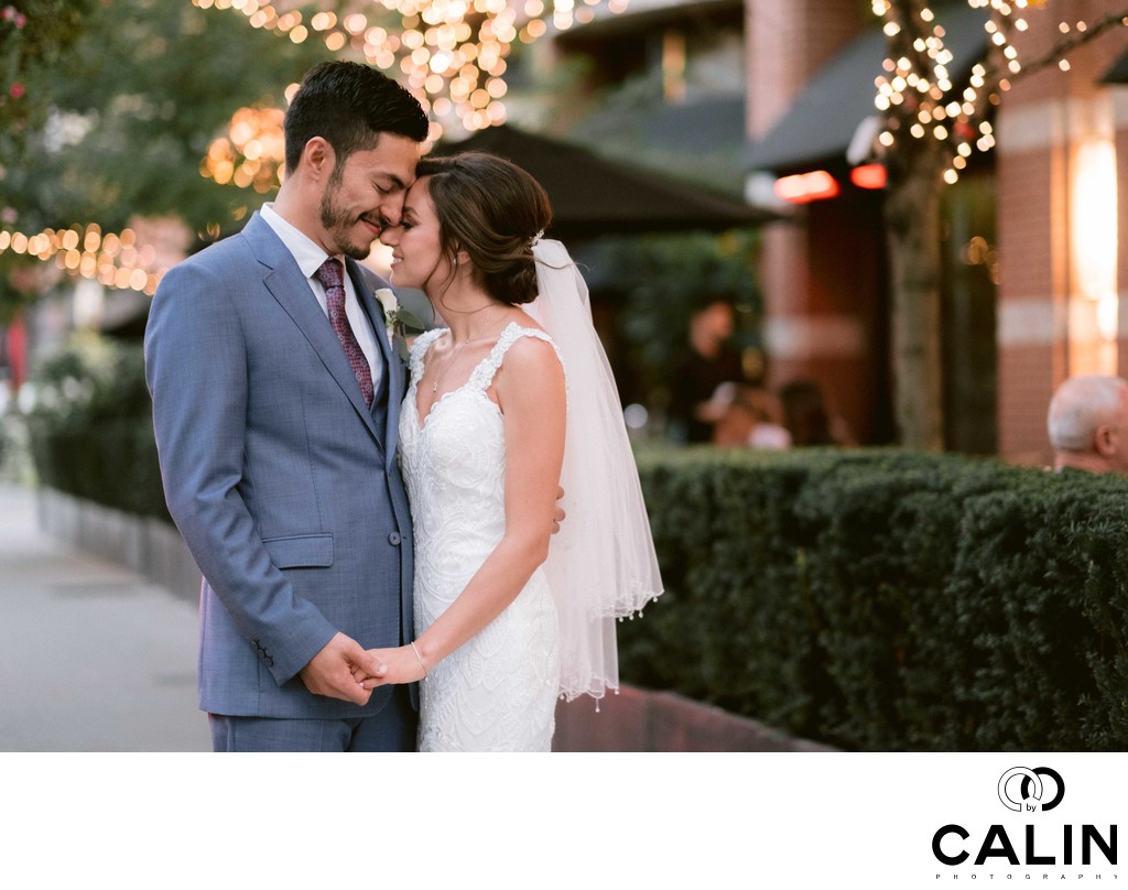 Newlyweds Touch Foreheads 