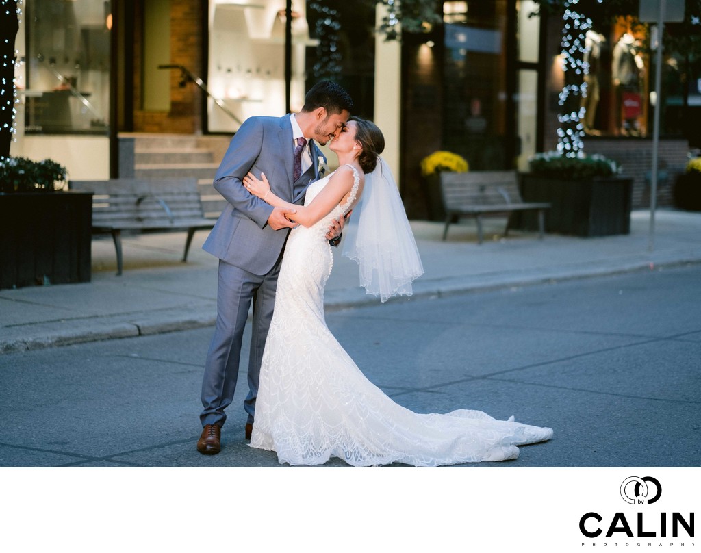 Groom Dips Bride Near Sassafraz