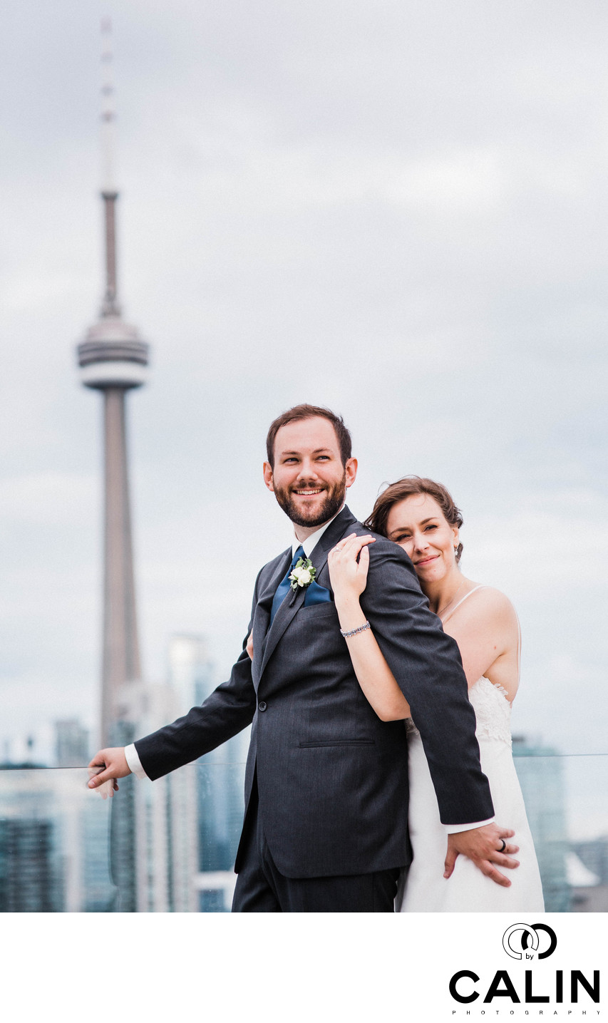 Bride and Groom Hug on Thompson Hotel Toronto Rooftop