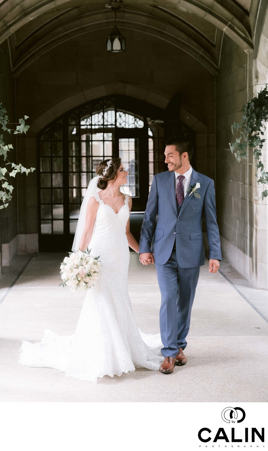 Bride and Groom Walk Hand in Hand