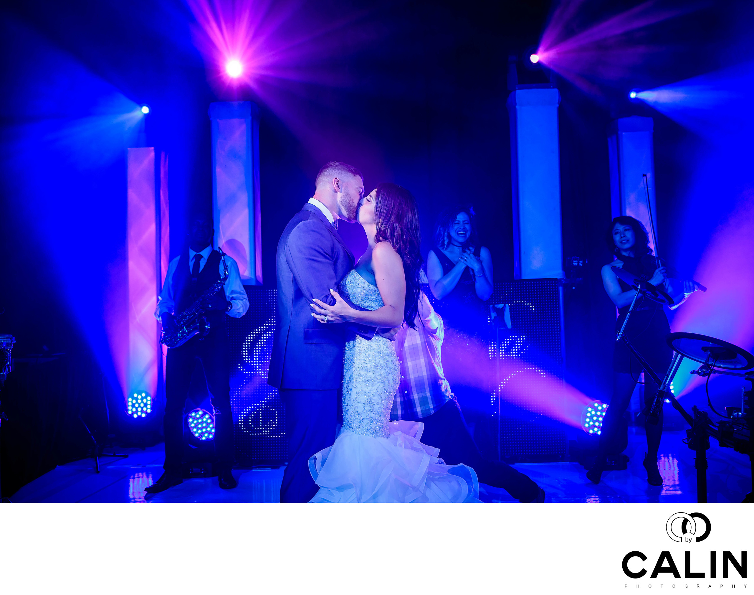 bride-and-groom-kiss-on-dance-floor-chateau-le-parc-wedding-amazing
