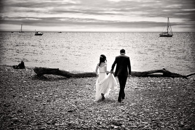 Bride and Groom Walk on Cherry Beach