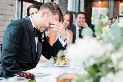 Groom Reacts to Speeches at Storys Building Wedding