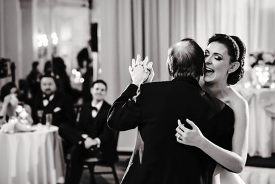 Bride Laughs during Father Daughter Dance