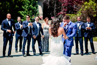 Emotional Groom and Bridal Party