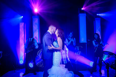 Bride and Groom Kiss on Dance Floor