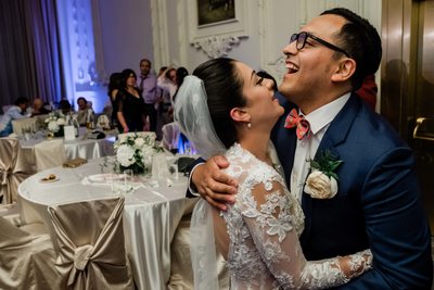 Newlyweds Laugh after Wedding in the Crystal Ballroom