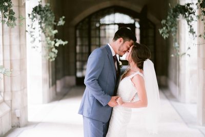 Bride and Groom Touch Foreheads Before Kiss