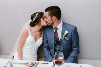 Bride and Groom Kiss at Sassafraz