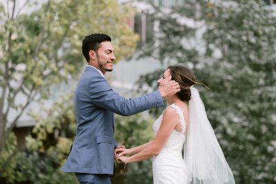 Groom Arranges Bride's Hair