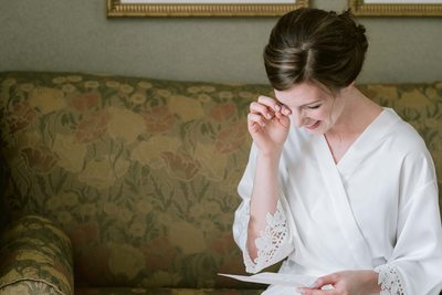 Bride Reads Groom's Letter at Old Mill Toronto