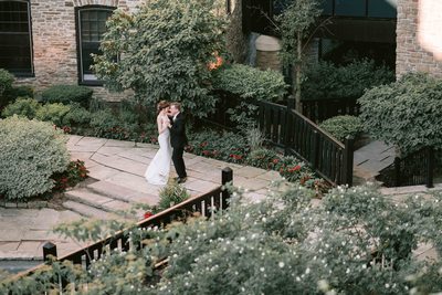 Newlyweds Dance in the Courtyard at Old Mill Toronto