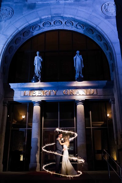 Bride and Groom in Front of Liberty Grand