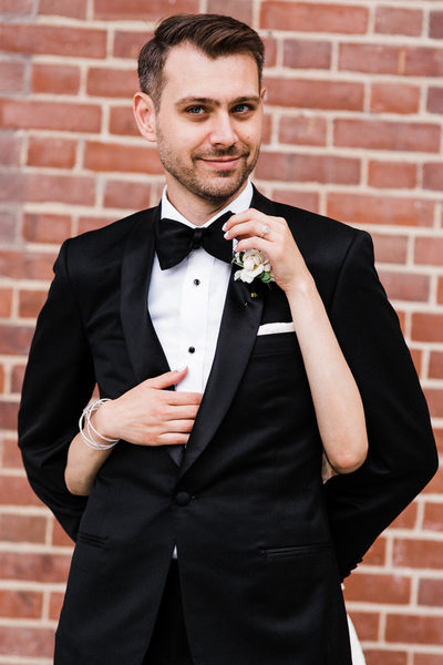 Quirky Portrait of the Groom at Storys Building Wedding