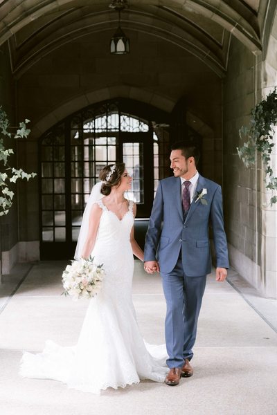 Bride and Groom Walk Hand in Hand