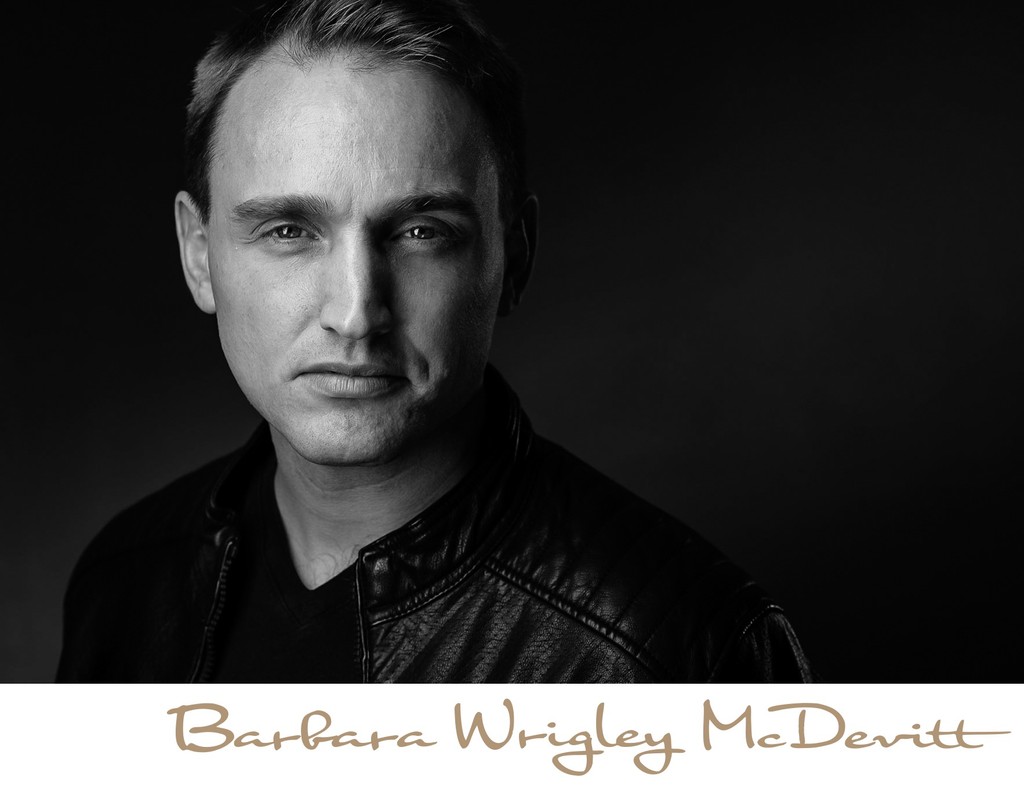 Low key portrait of a man in black and white