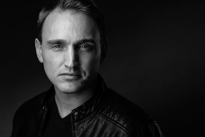 Low key portrait of a man in black and white