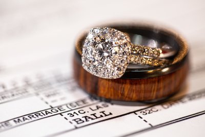 Creative wedding ring photos with marriage license 
