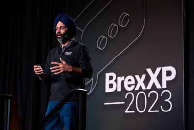 keynote speaker on stage at BREx XP conference