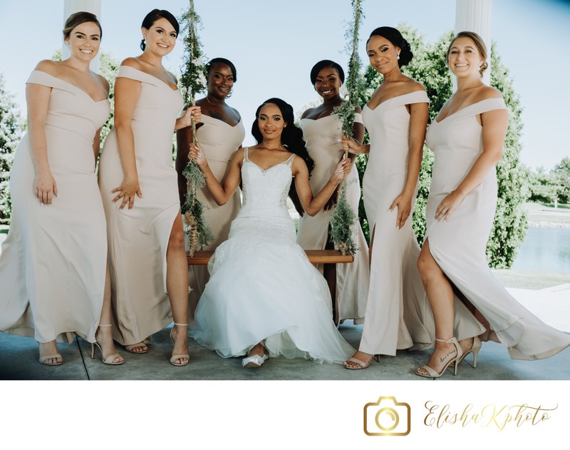 Bride with Bridesmaids on the Swing