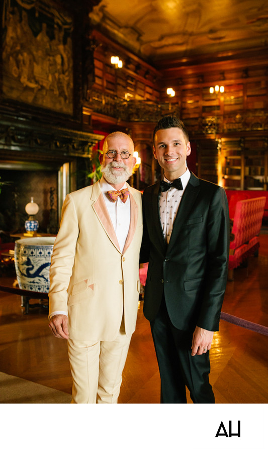 Two Men in Formalwear Inside a Historic Library