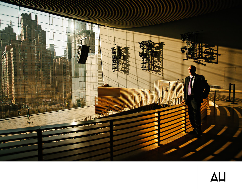 Executive Portrait in Sunlit Event Venue