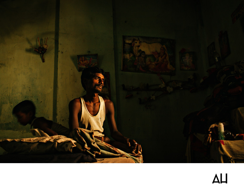 Rice Mill Worker at Home in Low Light