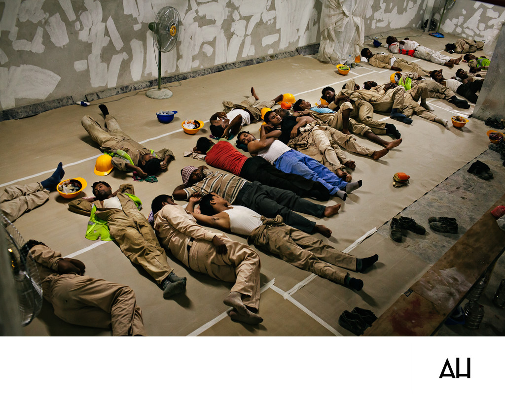 Construction Workers Rest Between Shifts