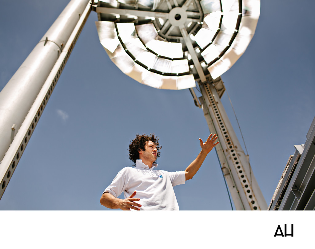 Engineer Beneath a Solar Thermal Concentrator